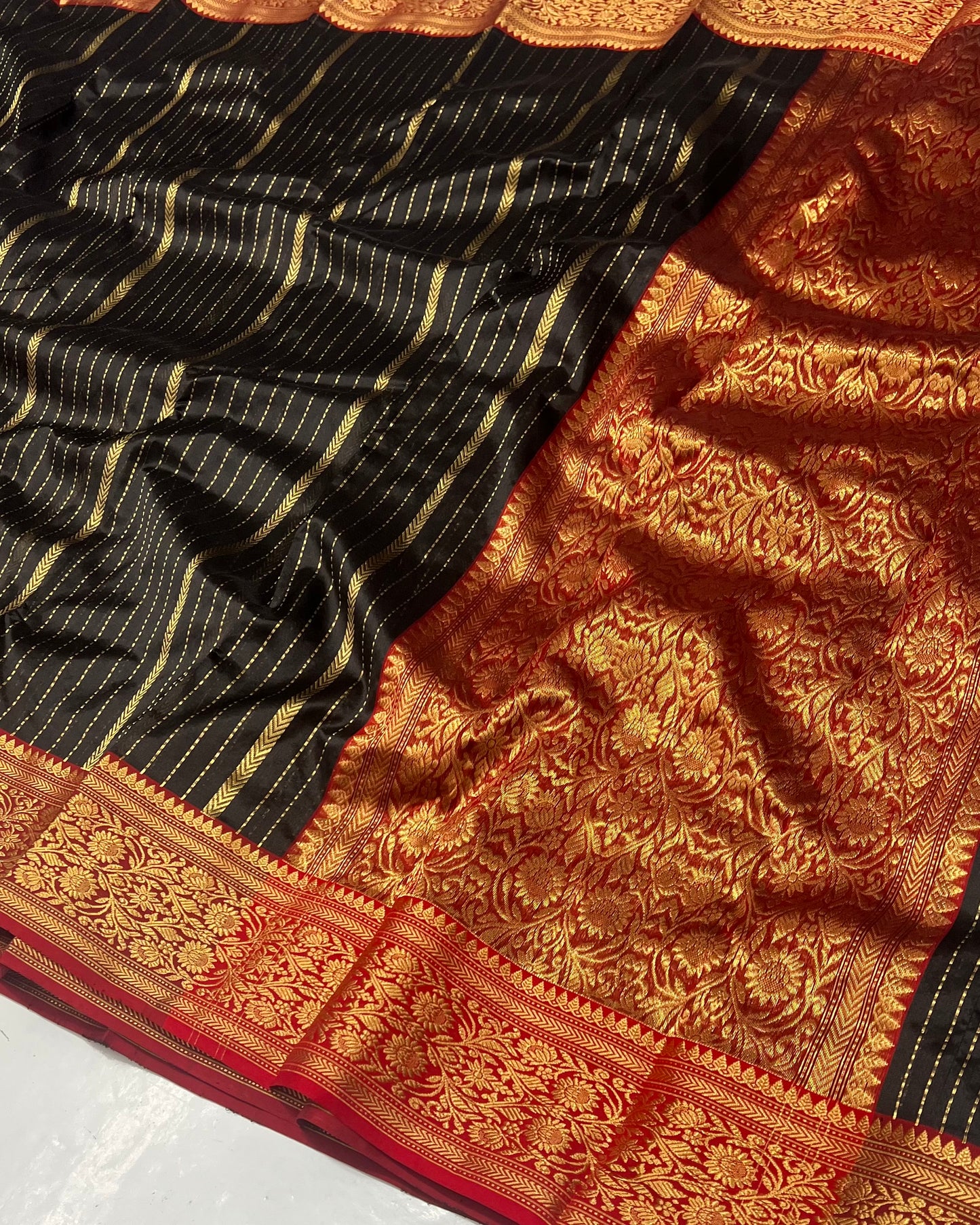 Black colour red cantrast border saree