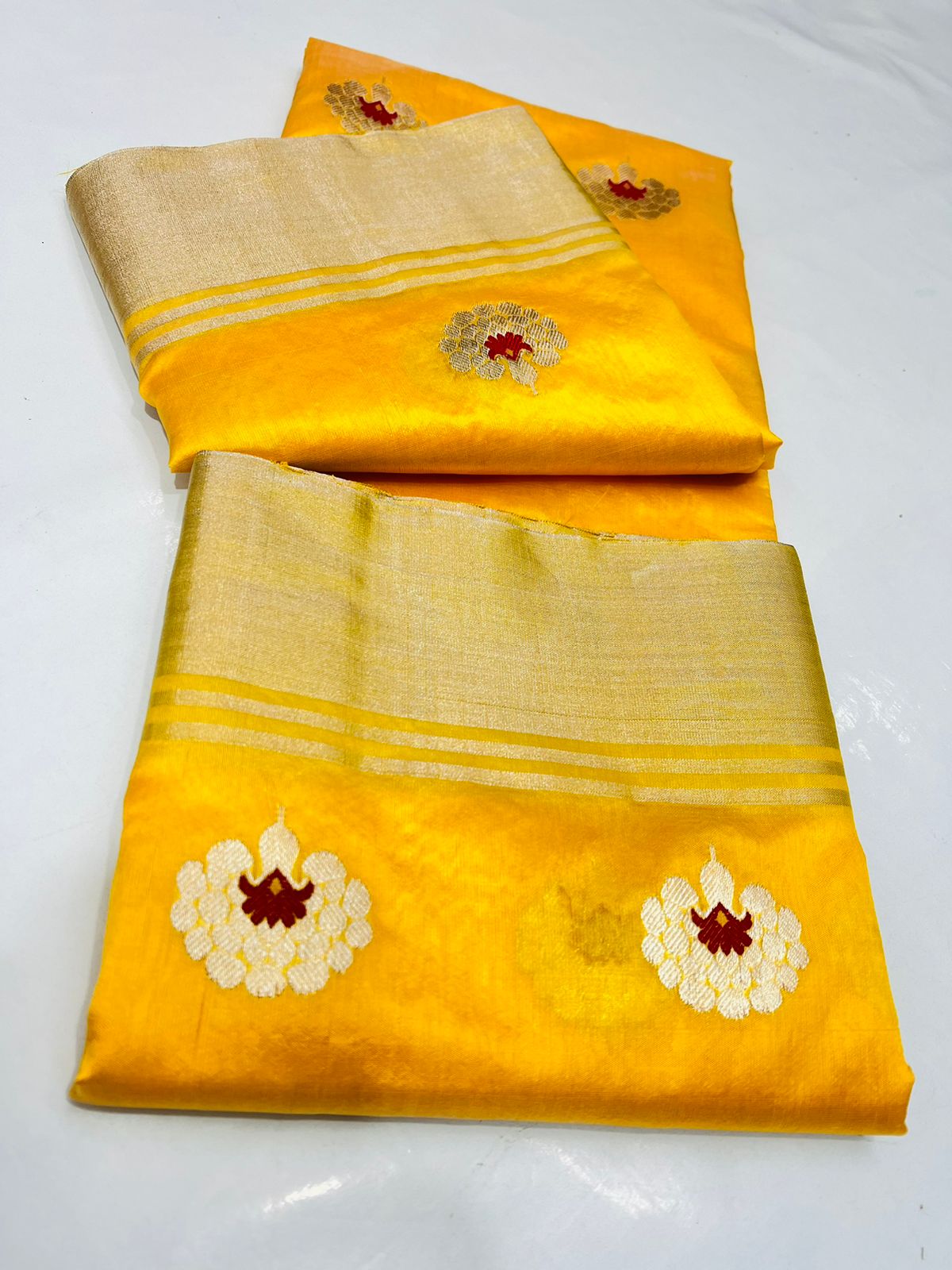 Yellow colour mena motif silk saree